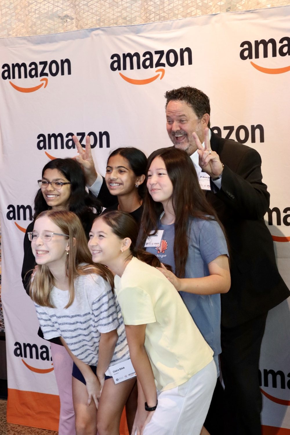 Orblynx students with an Amazon host during the visit